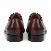 Back view of burgundy leather lace-up dress shoes