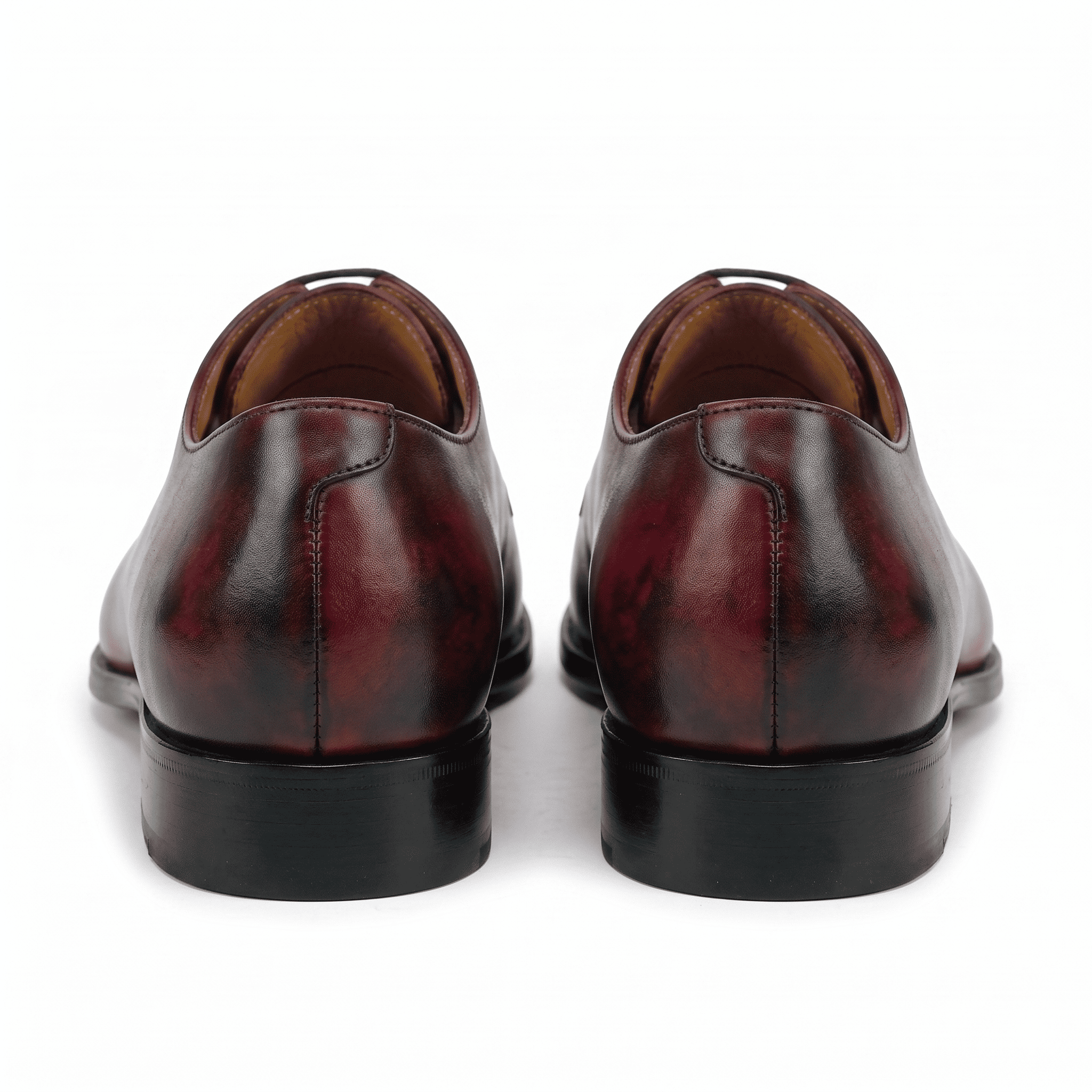 Back view of burgundy leather lace-up dress shoes