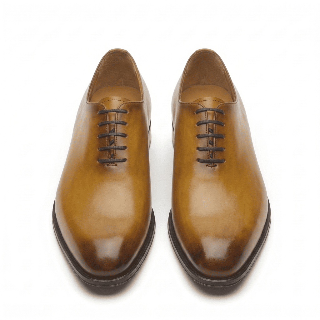 Front view of tan leather lace-up dress shoes