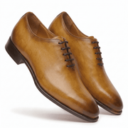 Tan leather lace-up dress shoes three-quarter view