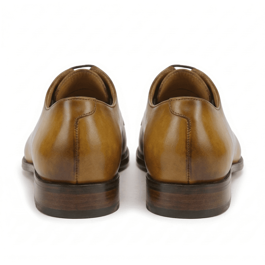 Back view of tan leather lace-up dress shoes