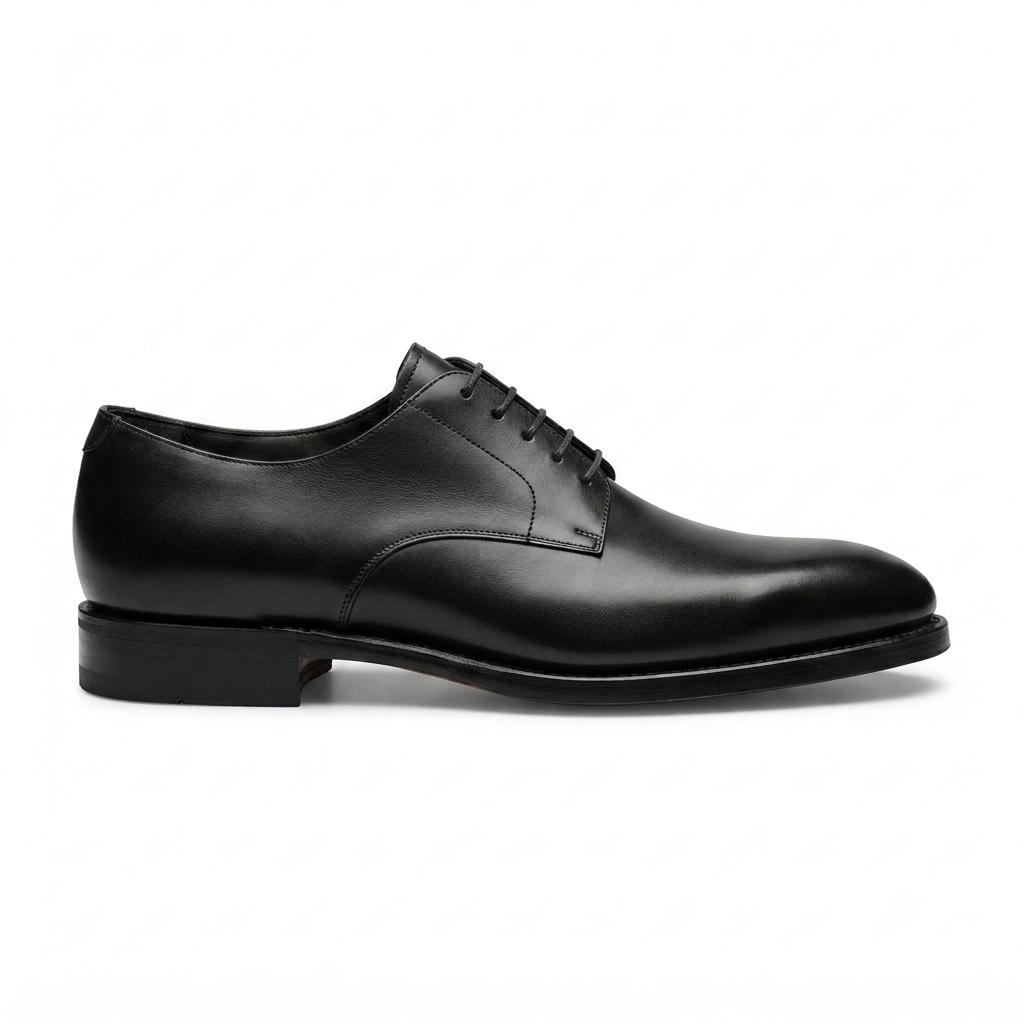 Side profile of black leather Oxford dress shoe