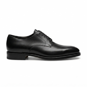 Side profile of black leather Oxford dress shoe