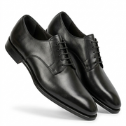 Angled view of black leather Oxford shoes for men