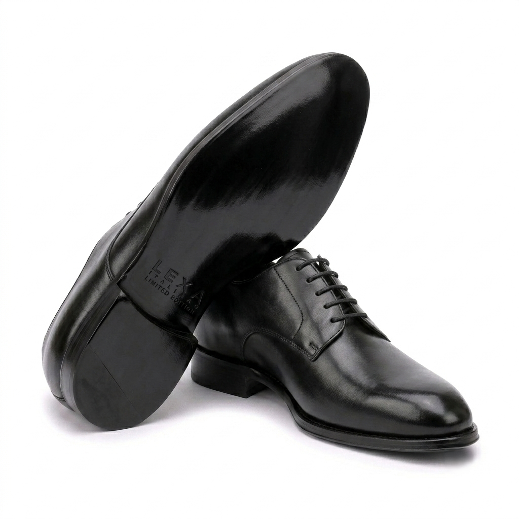 Angled view of black leather Oxford shoes showing leather soles