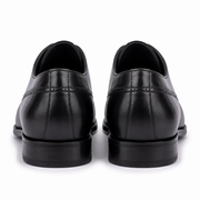 Black leather Oxford shoes viewed from the back