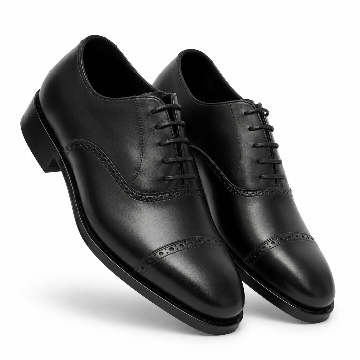 Angled view of black leather Oxford formal shoes