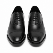 Front view of black leather Oxford shoes for men