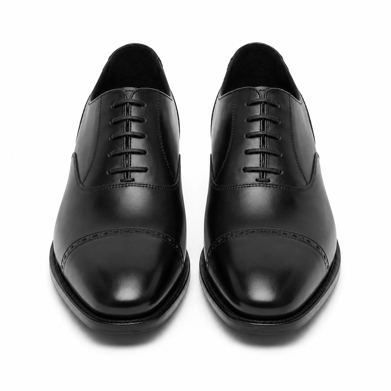 Front view of black leather Oxford shoes for men