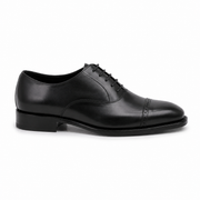 Side profile of a black leather Oxford formal shoe