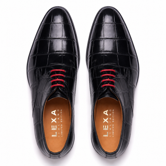 Top view of black leather Oxford shoes with red laces