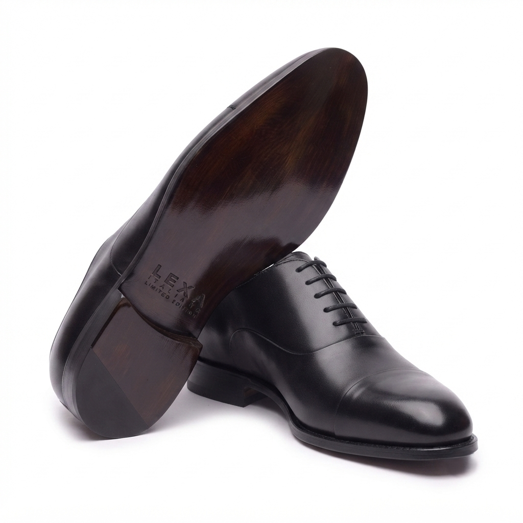 Sole view of black leather Oxford dress shoe