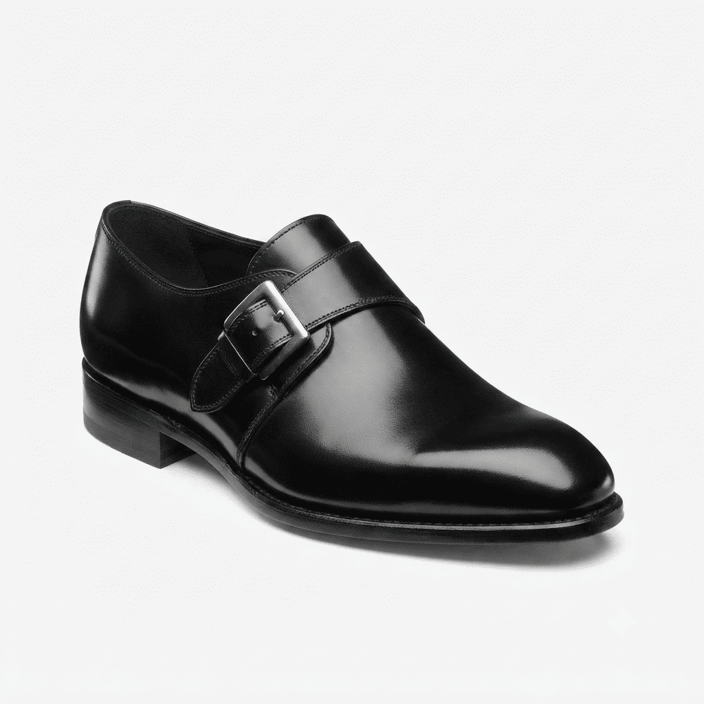 Front angled view of black patent leather monk strap shoes