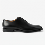Side profile of a black leather Oxford formal shoe