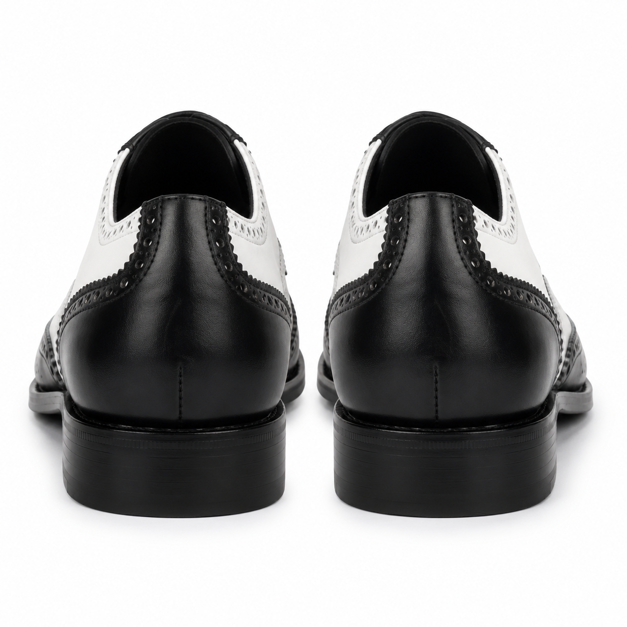 Rear view of black and white leather brogue shoes