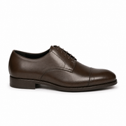 Side profile of dark brown leather Derby dress shoe