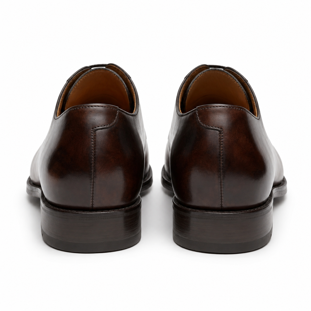 Rear view of dark brown leather Oxford shoes showing the heel design