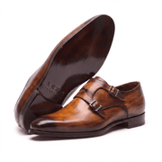 Brown leather double monk strap shoe sole and side view