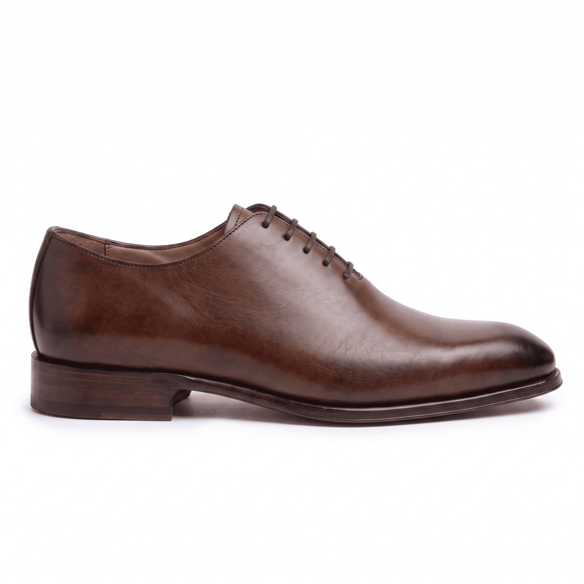 Side profile of brown leather Oxford formal shoes