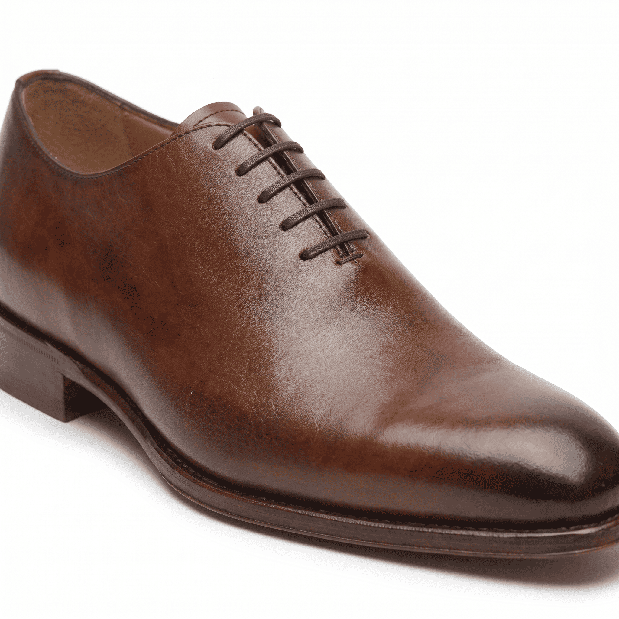 Side view of brown leather Oxford dress shoes