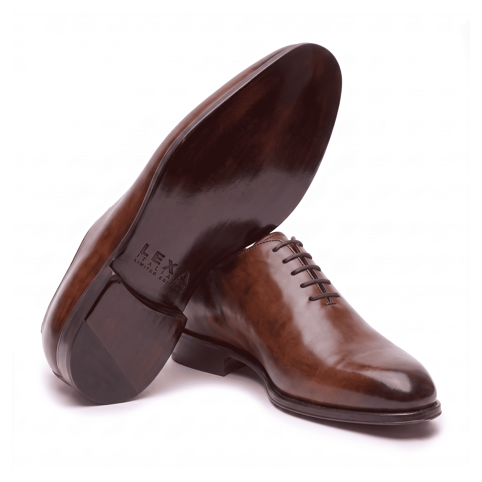Bottom view of brown leather Oxford shoes showing leather sole