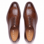 Top view of brown leather Oxford shoes for men