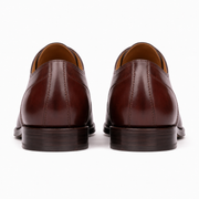 Rear view of dark brown leather Oxford shoes for men