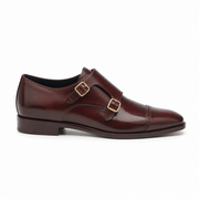 Side profile of dark brown leather double monk strap shoe for men