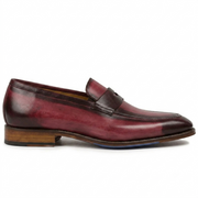 Side profile of burgundy leather penny loafers for men