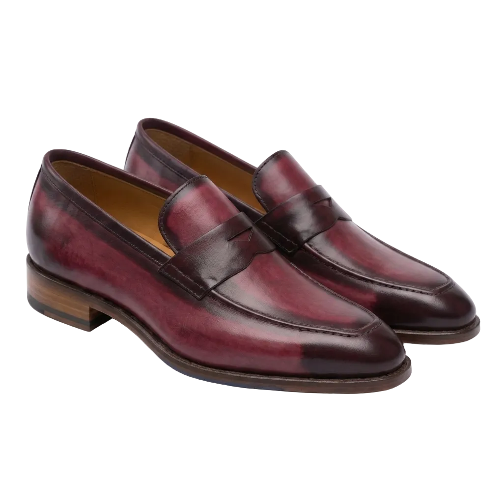Burgundy leather penny loafers for men in three-quarter view