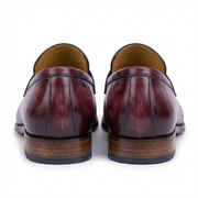 Back view of burgundy leather penny loafers showing the heel design