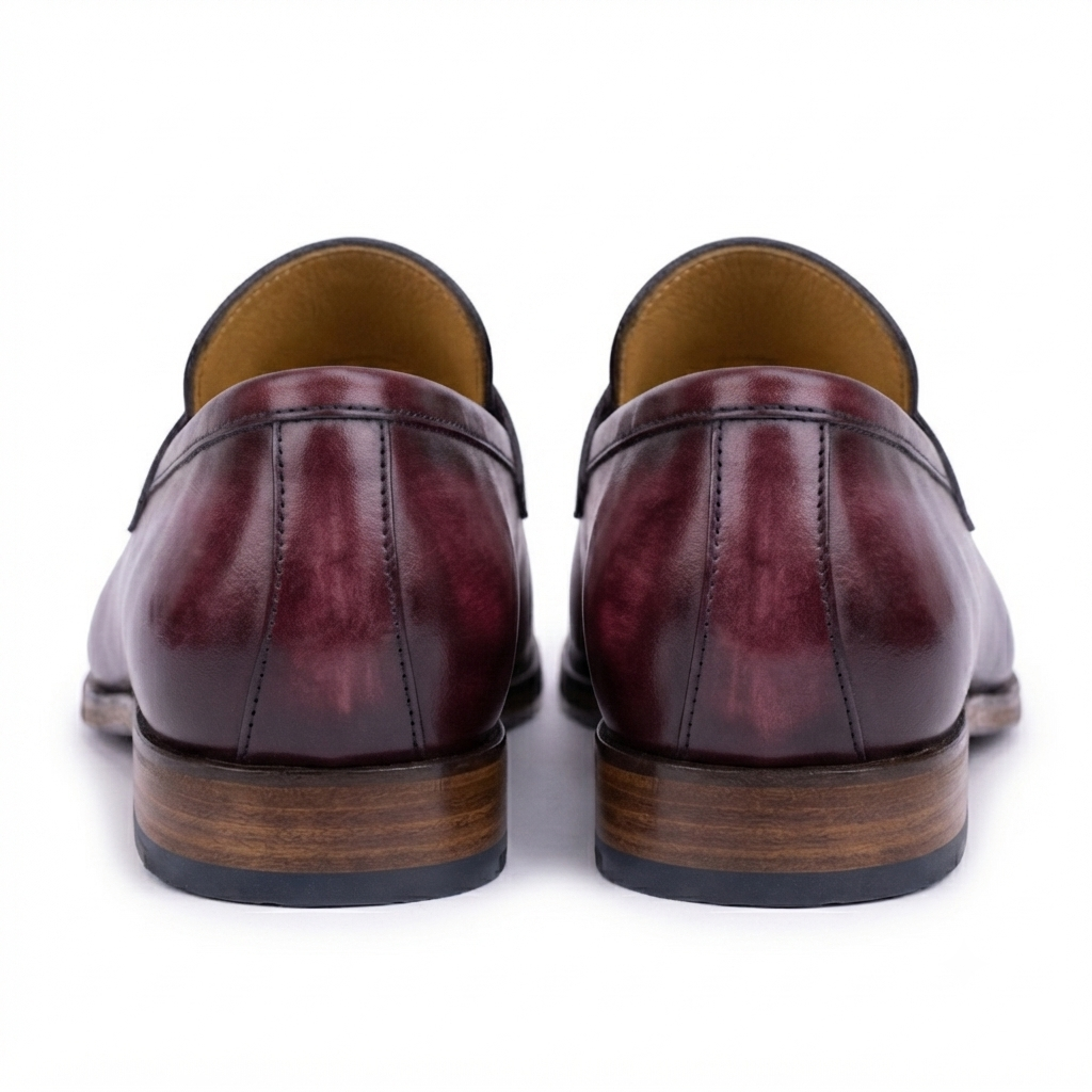 Back view of burgundy leather penny loafers showing the heel design