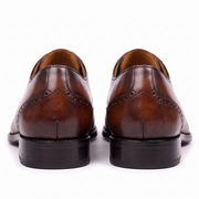 Brown Oxford shoes showing rear heel view