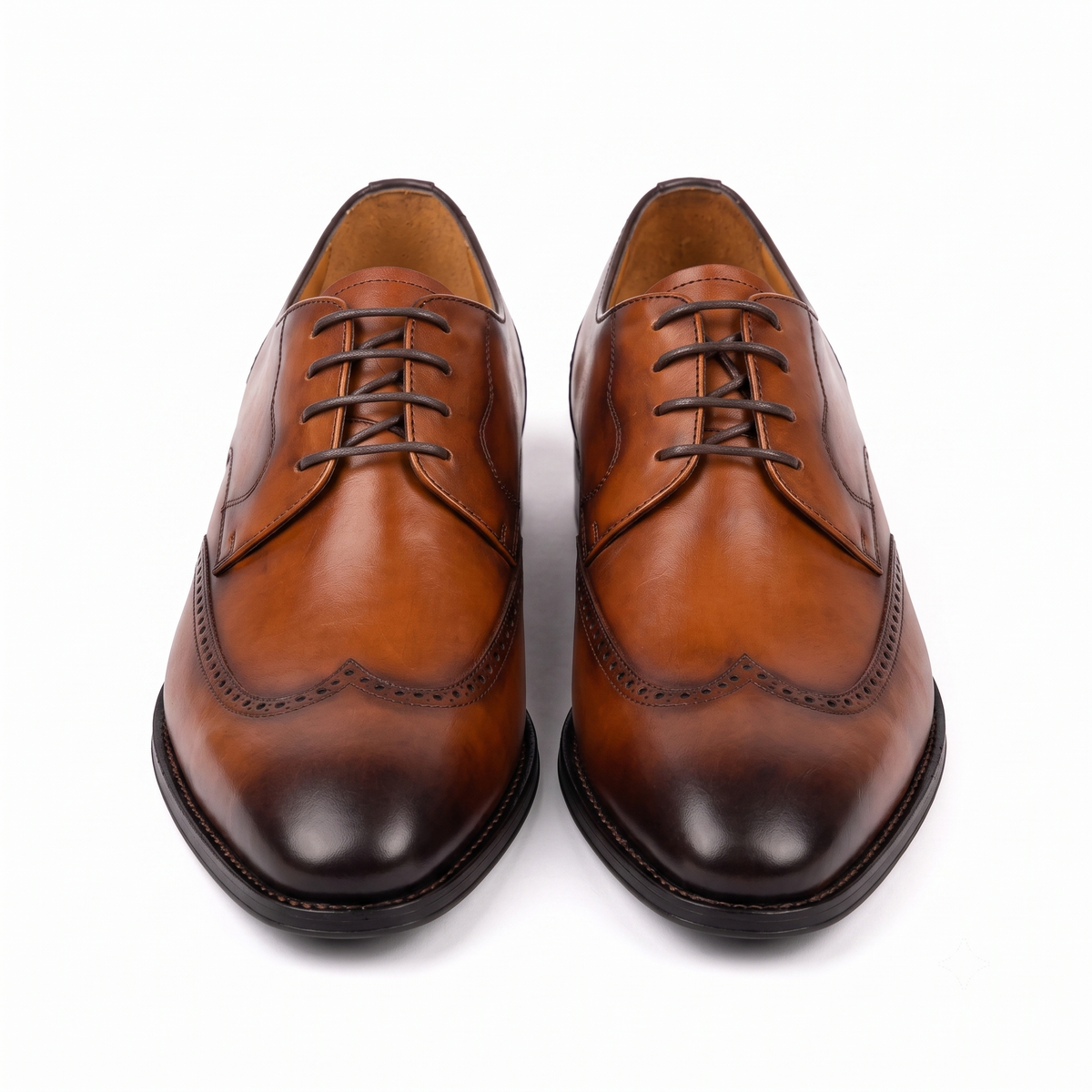 Pair of brown men's Oxford shoes front view