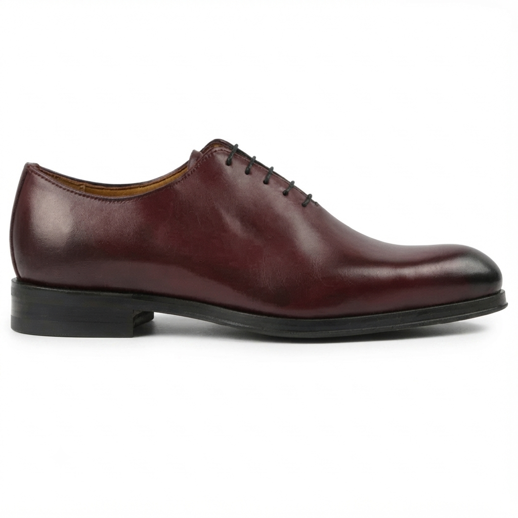 Side profile of a brown leather Oxford formal shoe