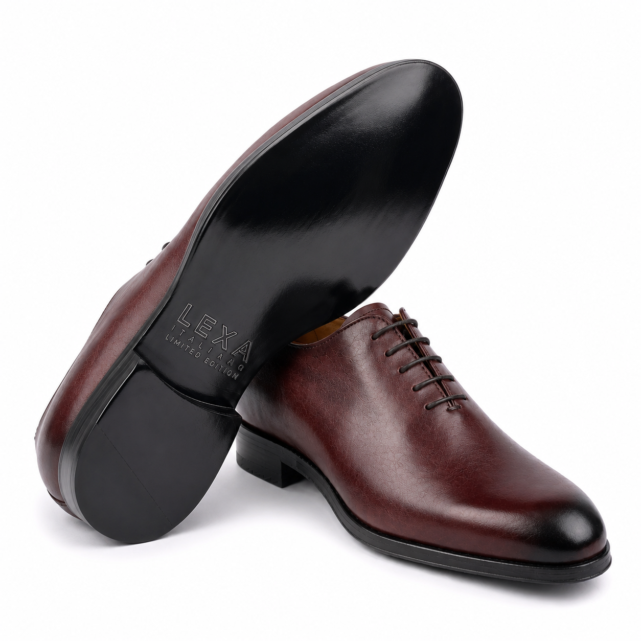 Bottom view of brown leather Oxford shoe showing black sole