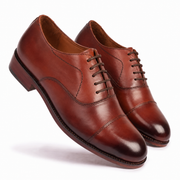 Angled view of handcrafted brown leather Derby shoes