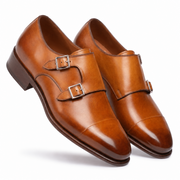 Angled view of men's tan brown double monk strap leather shoes