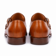 Back view of tan brown double monk strap leather shoes