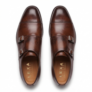 Pair of dark brown leather double monk strap shoes viewed from above