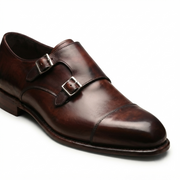 Dark brown leather double monk strap shoe angled side view