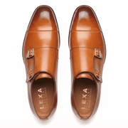 Pair of brown leather double monk strap shoes viewed from above