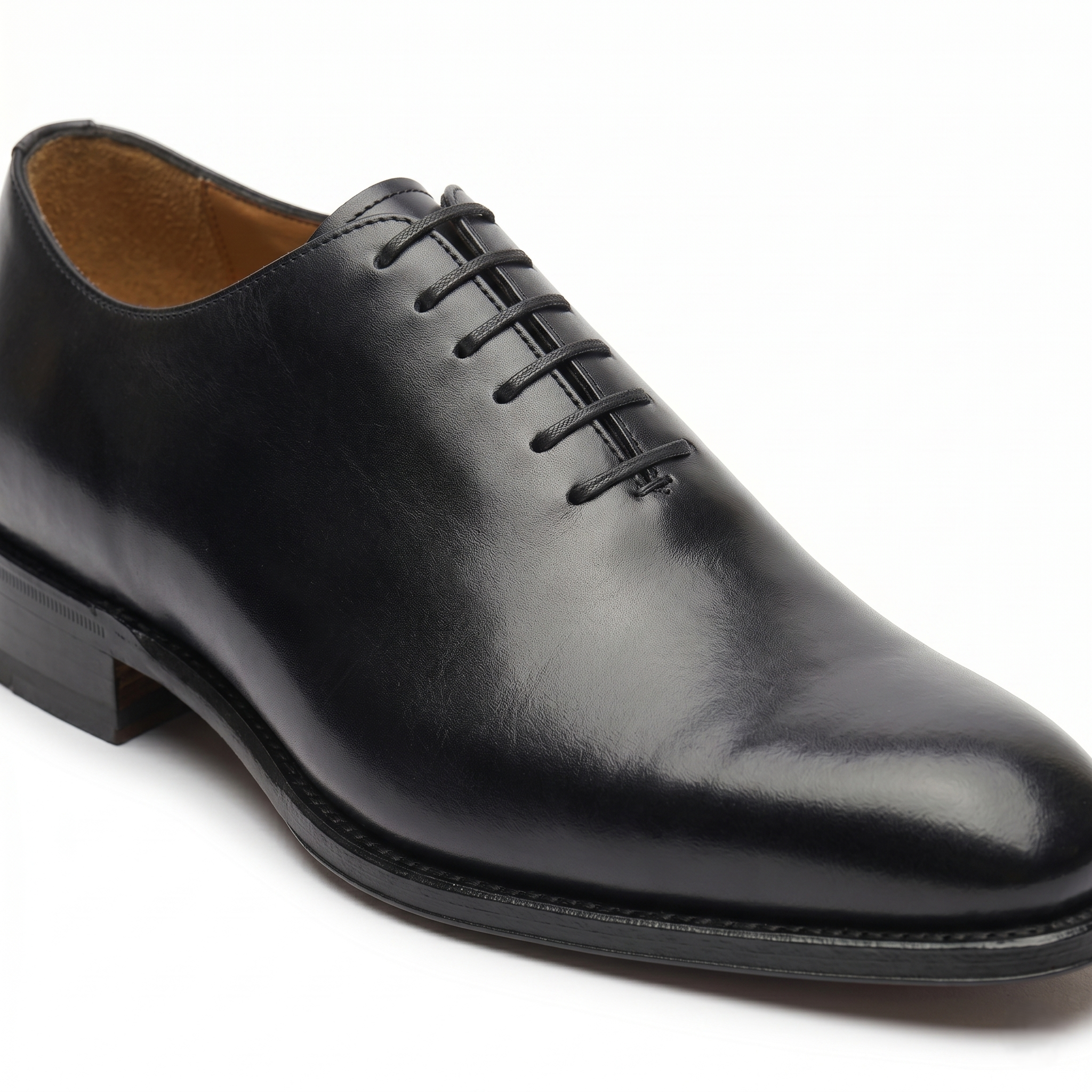 Side view of black leather Oxford dress shoes