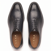 Top view of black leather Oxford shoes for men