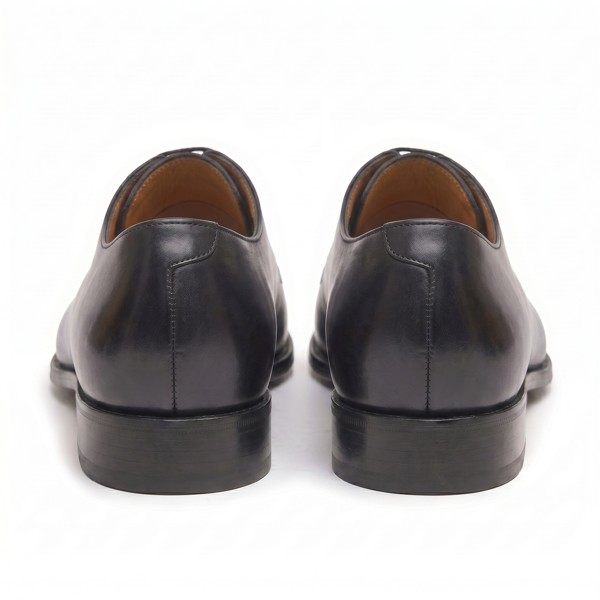 Rear view of black leather Oxford shoes showing heel detail