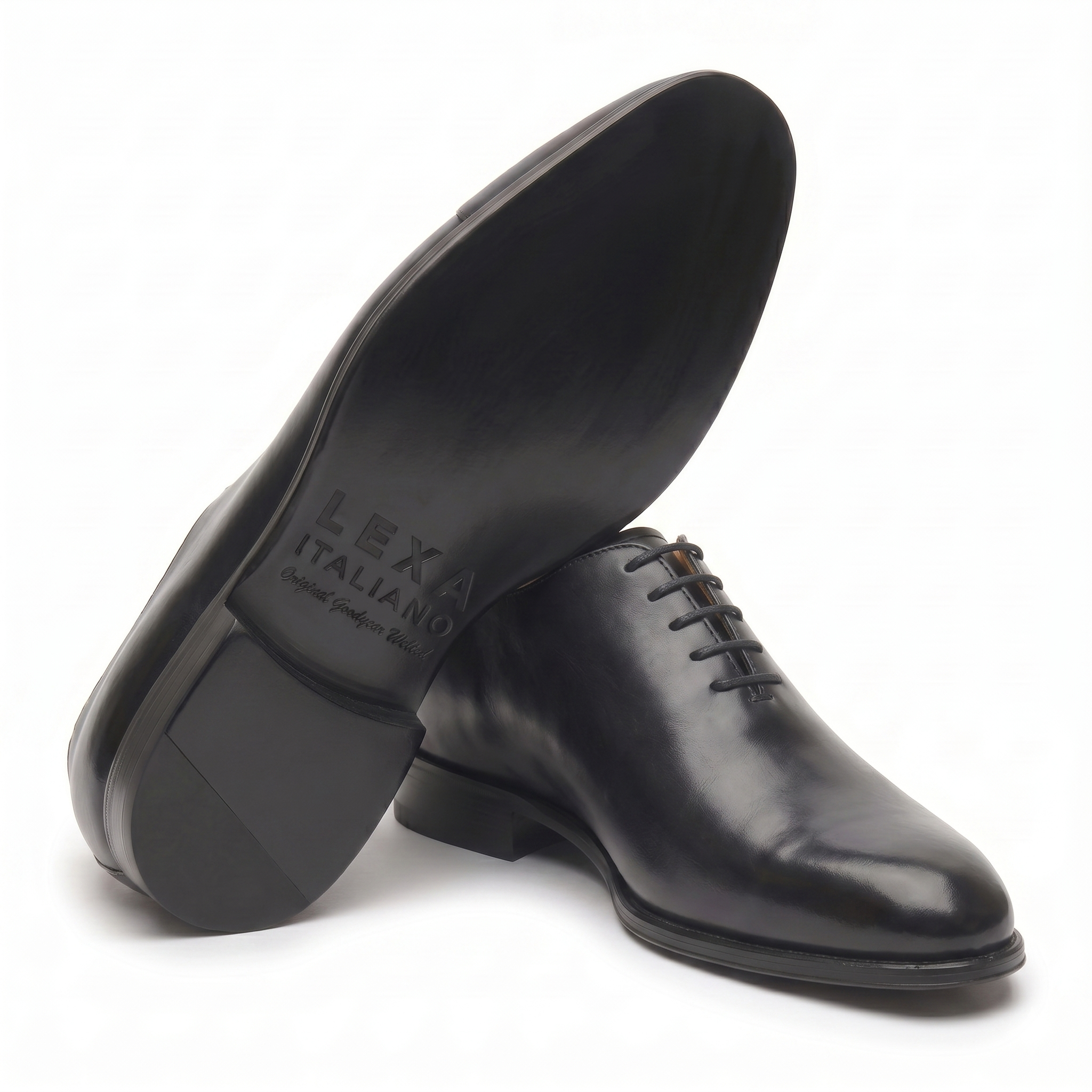 Bottom view of black leather Oxford shoes showing leather sole