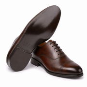 Sole view of brown leather Oxford shoe