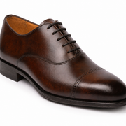 Side view of brown leather Oxford shoe