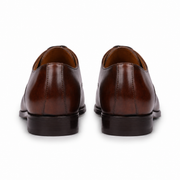 Back view of brown leather Oxford shoes