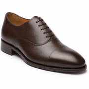 Side view of brown leather Oxford dress shoe